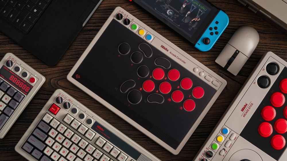 8BitDo Arcade Controller at the center of an 8BitDo setup (keyboards, mouse, Arcade Stick)
