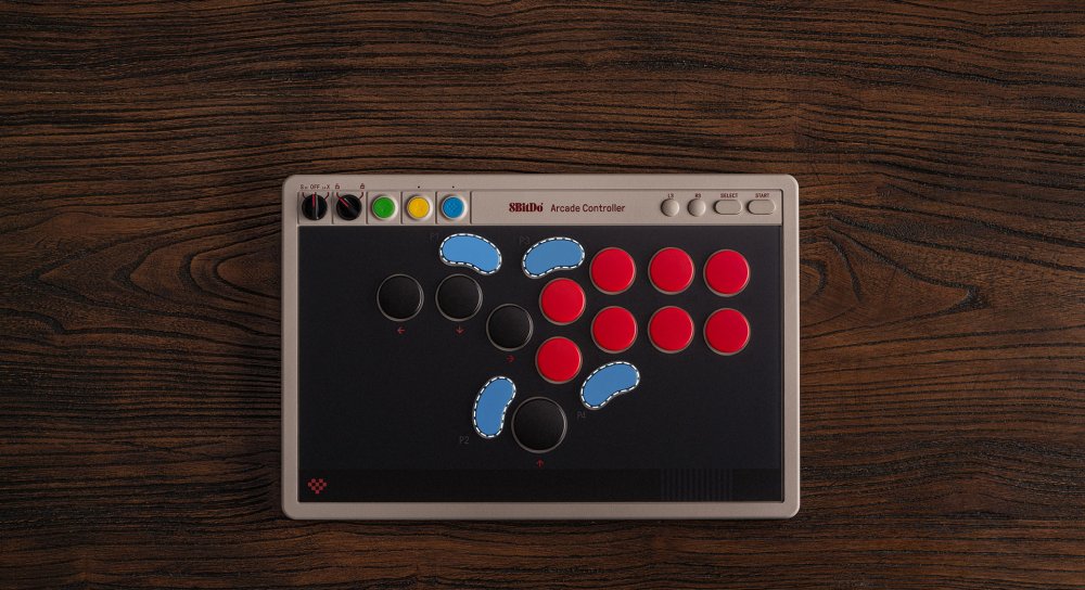 Top view: quad-directional button layout and ergonomic thumb zones